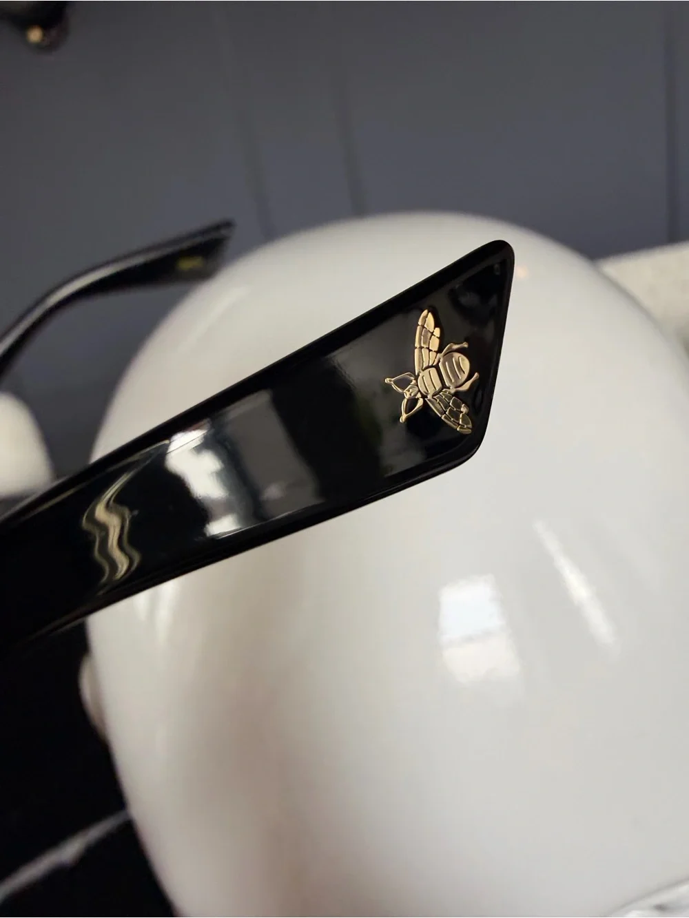 Gucci Black Frame Sunglasses with Gradient Purple Lenses